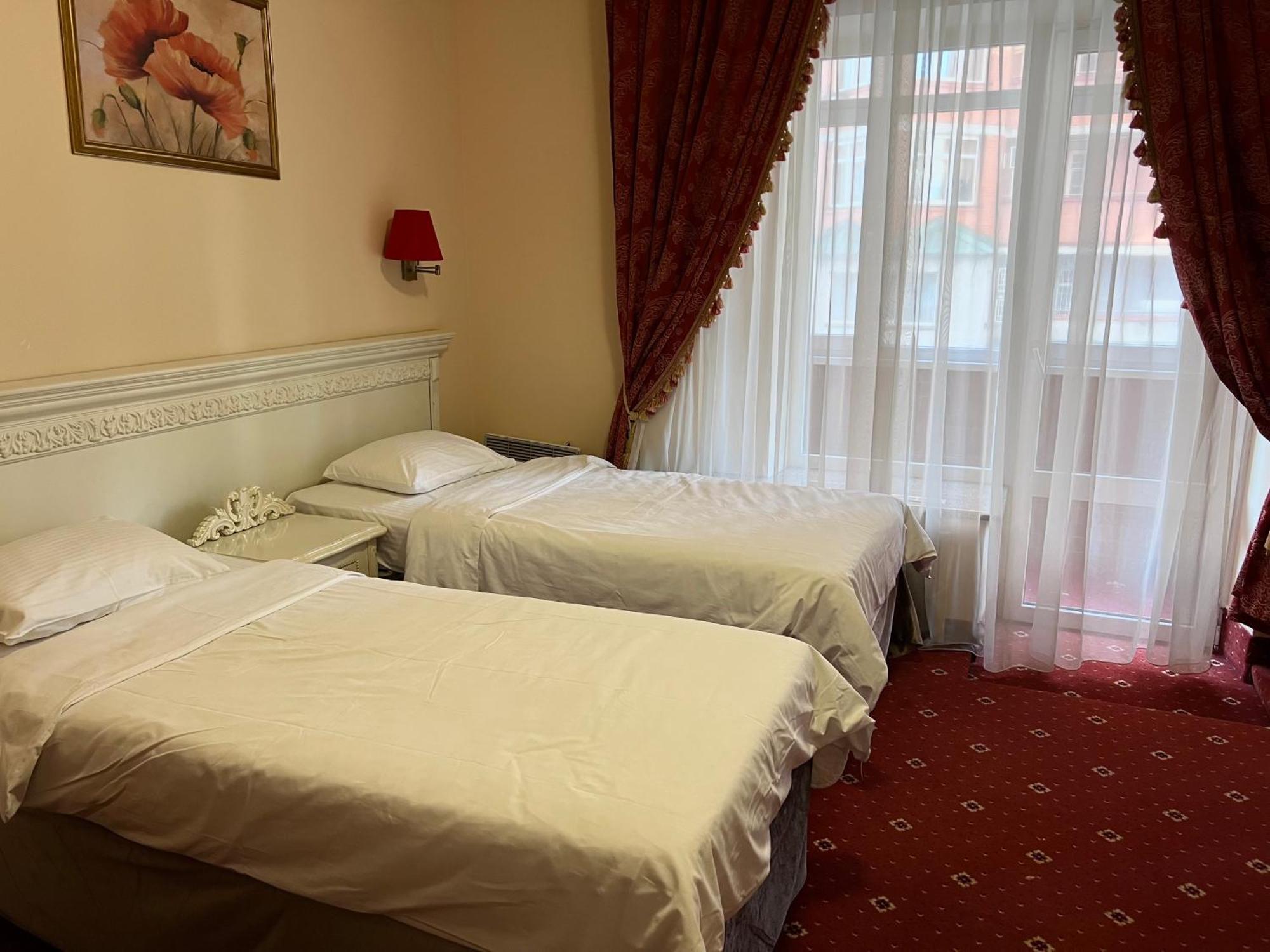 Royal City Hotel Kijev Szoba fotó